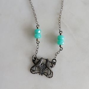 Two kissing birds necklace aqua beads